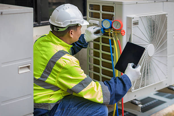 Professional Ac Installation technician working in Groton, MA
